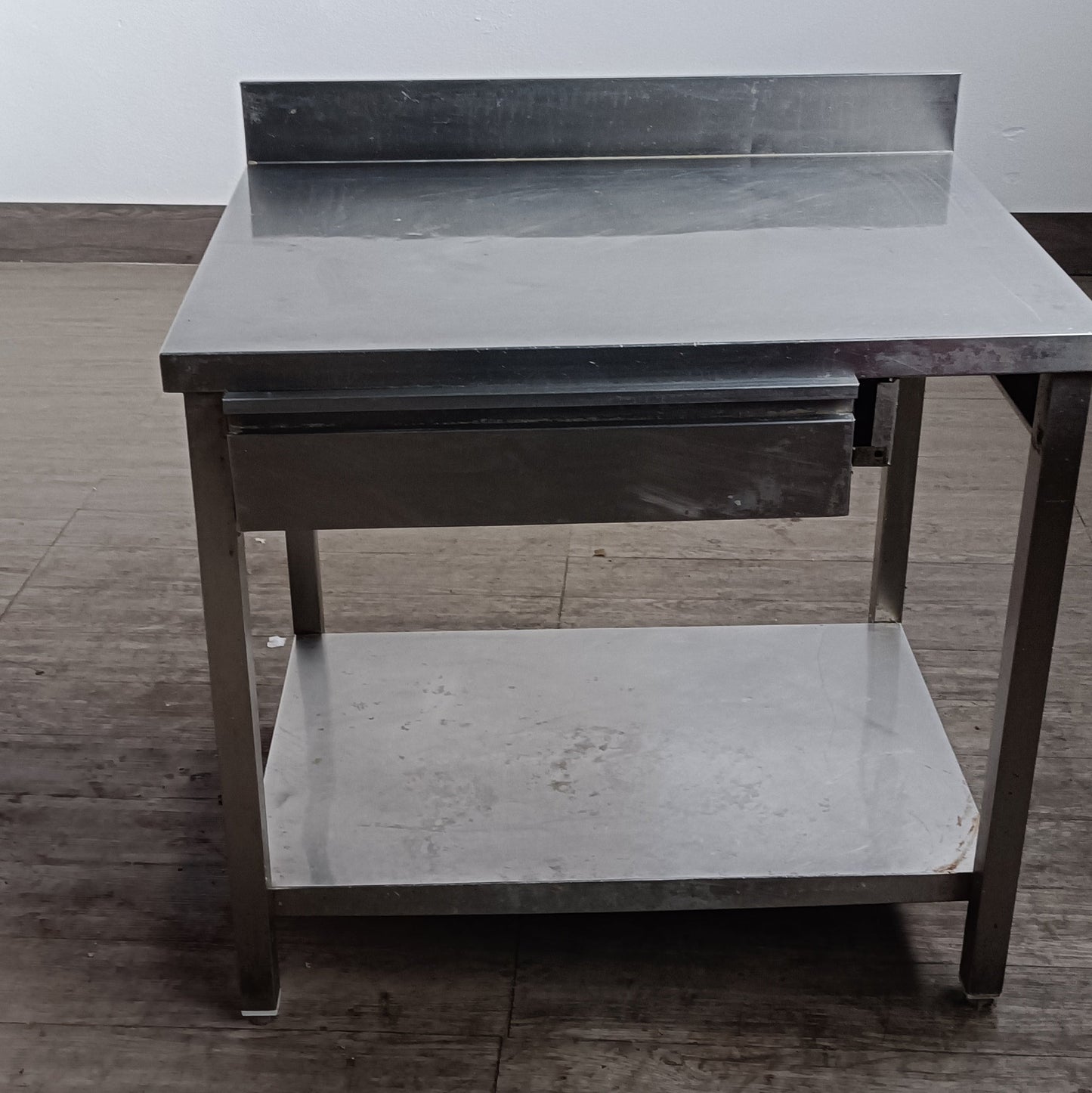 tavolo acciaio inox 90 x 70 con ripiano e cassetto 